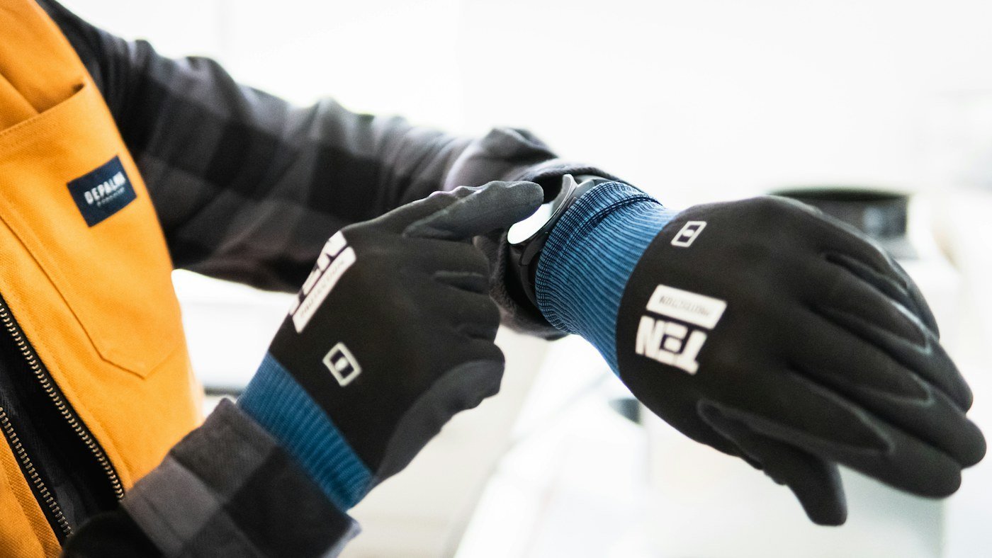 Close-up of work gloves worn by an electrician; category reference photograph